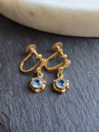 Antique Rolled Gold Delicate Floral Open Back Blue Crystal Drop Screw Back Earrings