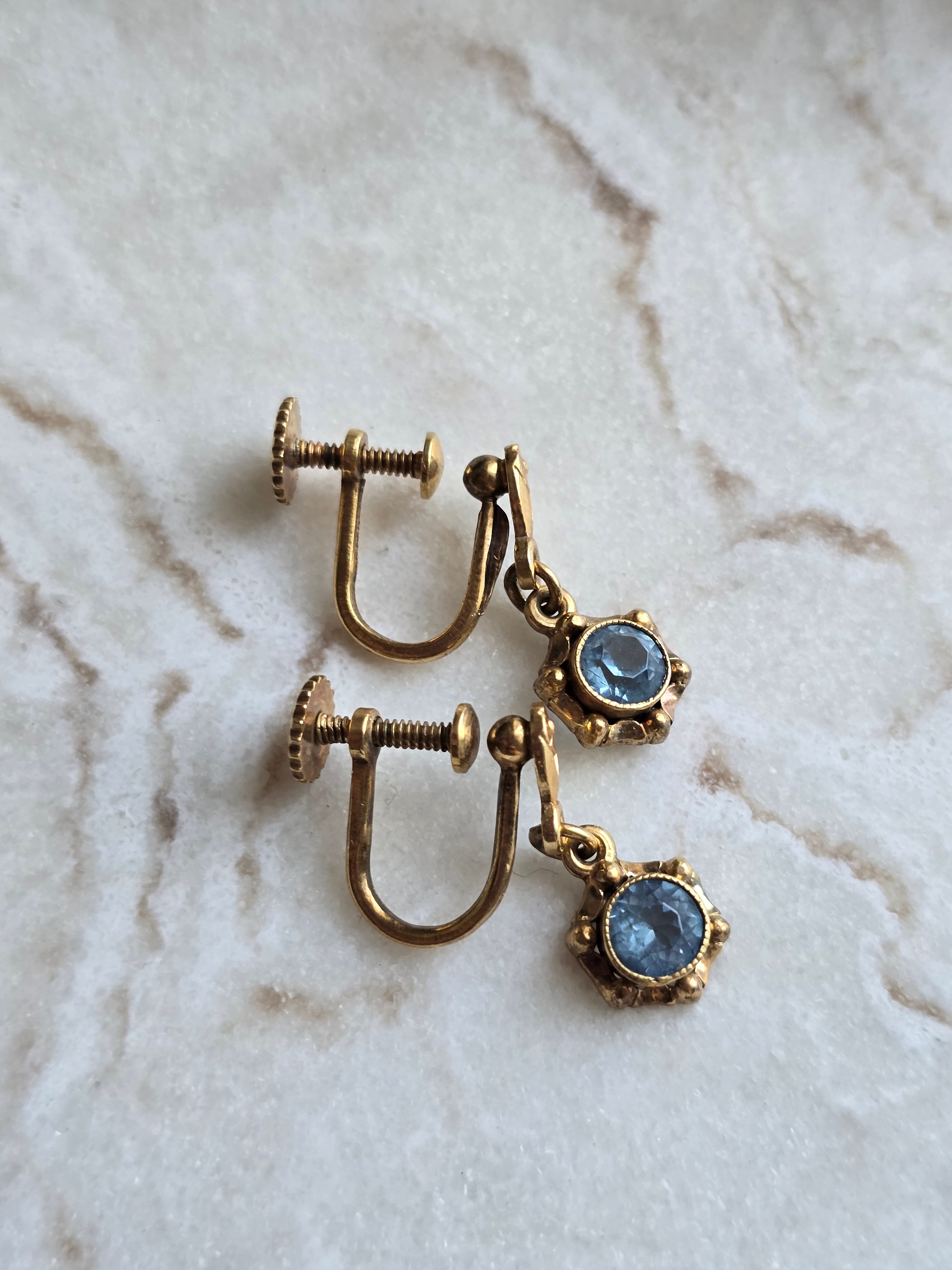 Antique Rolled Gold Delicate Floral Open Back Blue Crystal Drop Screw Back Earrings